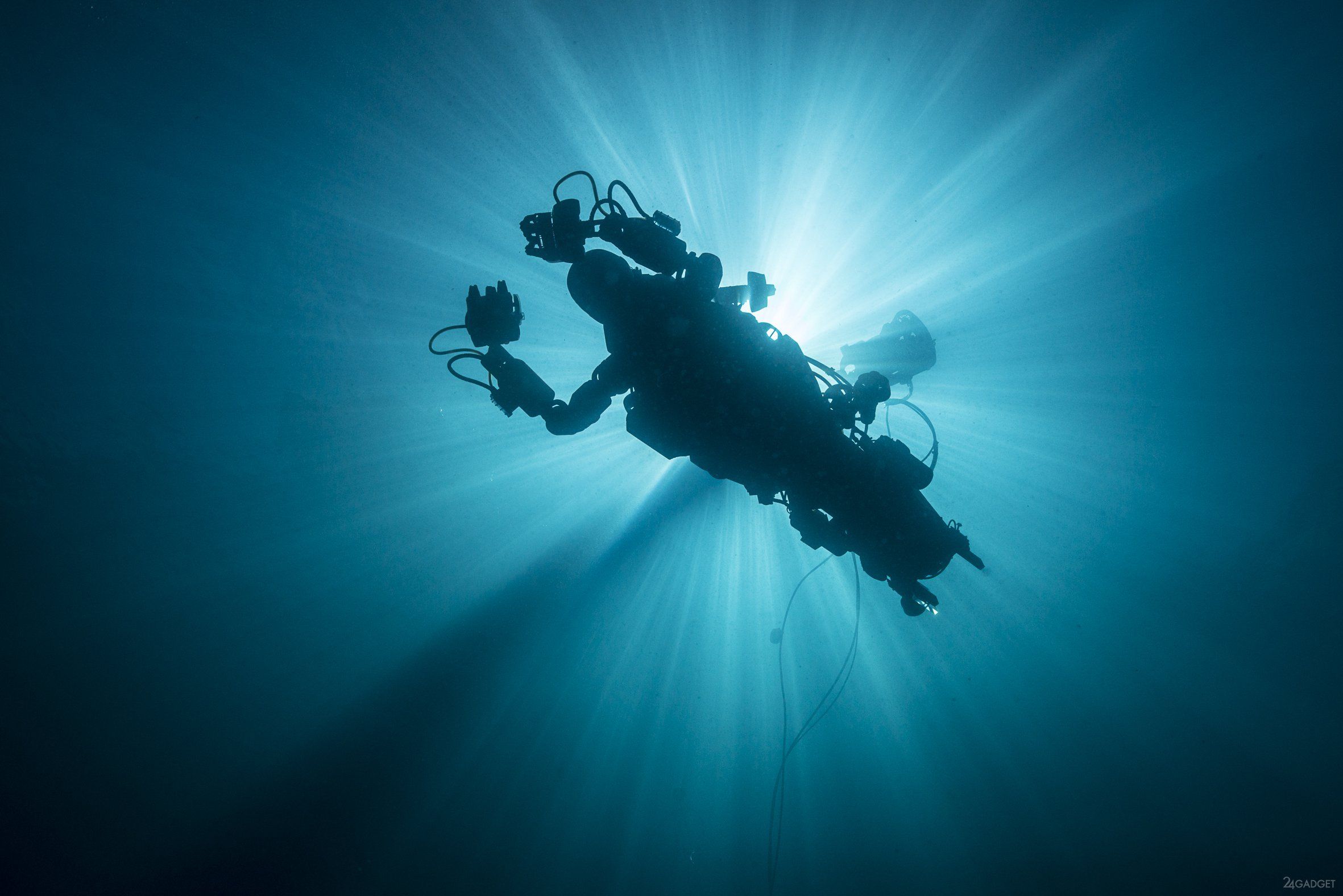 Использование подводных роботов. Подводные роботы. Роботы для исследования морских глубин. Робот под водой. Океанские глубины.