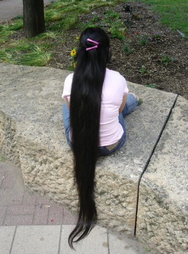Юная китаянка продала волосы, чтобы позвонить маме в другую провинцию